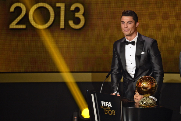 Real Madrid's Portuguese forward Cristiano Ronaldo delivers a speech after receiving the 2013 FIFA Ballon d'Or award for player of the year during the FIFA Ballon d'Or award ceremony at the Kongresshaus in Zurich on January 13, 2014. AFP PHOTO / OLIVIER MORIN (Photo credit should read OLIVIER MORIN/AFP/Getty Images)
