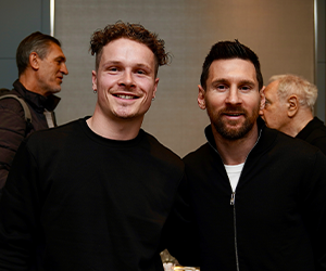Ryan Butterworth with Lionel Messi